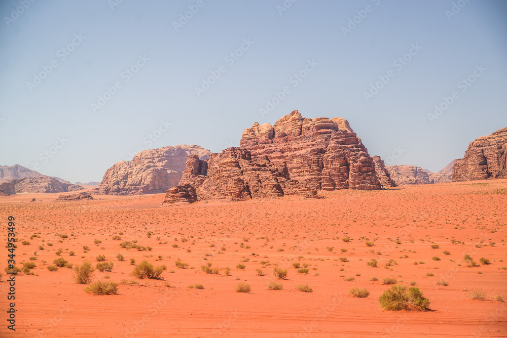 red rock desert formations in wadi rum red rock desert formations in wadi rum