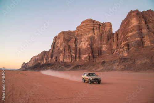driving through red rock desert wadi rum