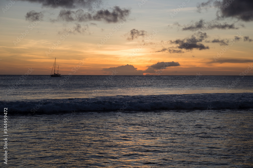 sunset beach sail boat