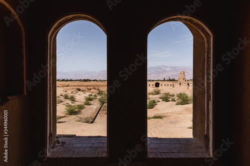 Interior of the caravanserai seen through two windows