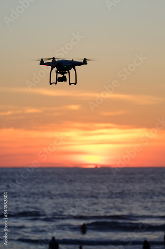 Drone quadcopter at sunset © Thanunchakorn