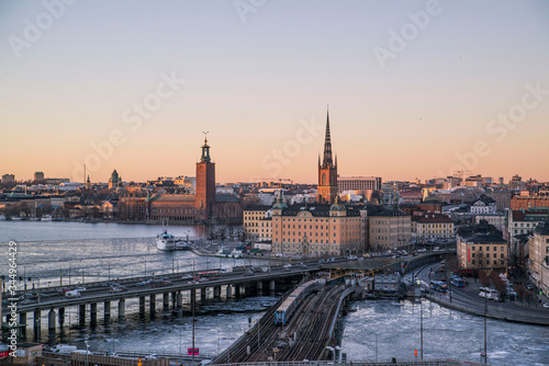 train tracks leading to downtown stockholm sweden at sunset