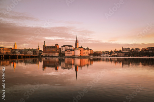 beautiful pink sunset and reflection of stockholm sweden