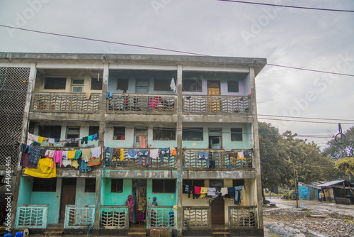 colorful laundry hanging outside of apartment in tanzania © Zach