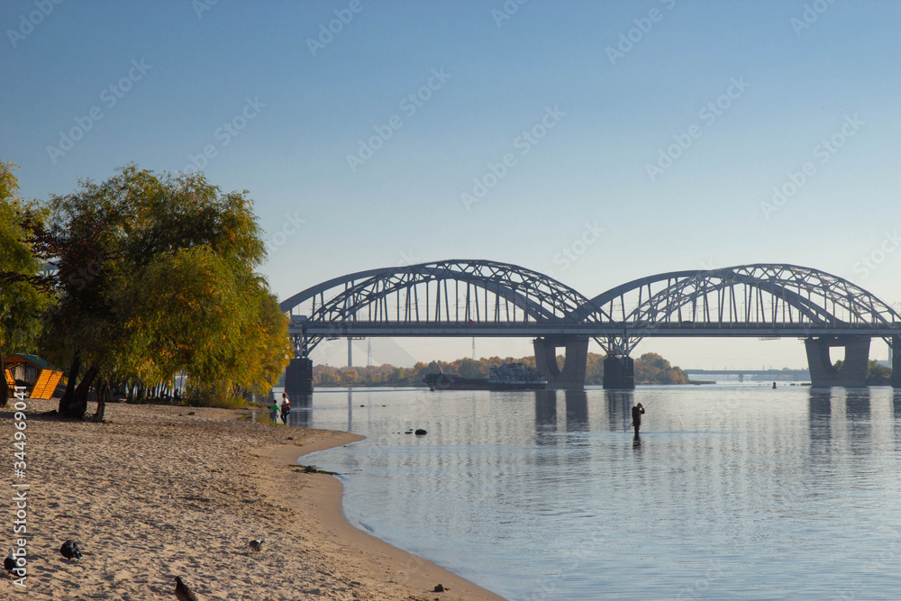 Fototapeta premium view towards the right bank of Dnieper river From Dniprovska Embankment, Kyiv, Ukraine