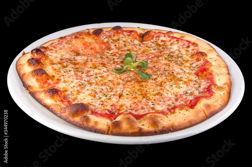 Tasty pizza margarita with tomato sauce, mozzarella, basil on a plate, isolated on black background
