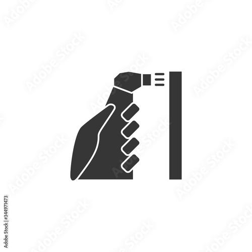 Hand with antiseptic in a bottle and desinfictant liquid sprays and processes the surface