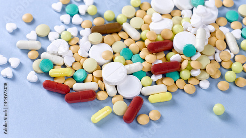 Close-up of many multi-colored pills, tablets and capsules