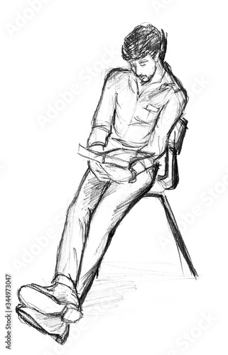 Fototapeta Naklejka Na Ścianę i Meble -  A rough sketch of a guy sitting on a chair and reading a book. Lead pencil on white paper. Isolated object.