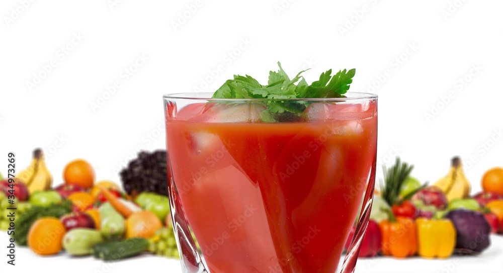 Colorful ripe vegetables and fruits and juice in a glass Colorful ripe vegetables and fruits and juice in a glass