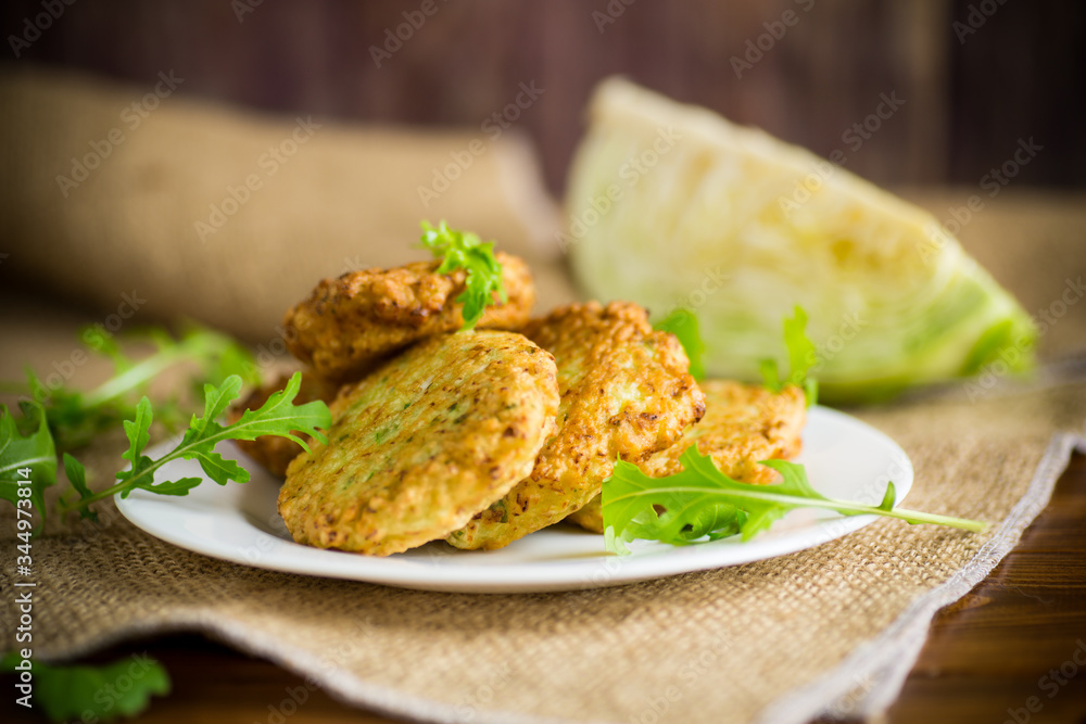 vegetable vegetarian fried cabbage pancakes in a plate vegetable vegetarian fried cabbage pancakes in a plate