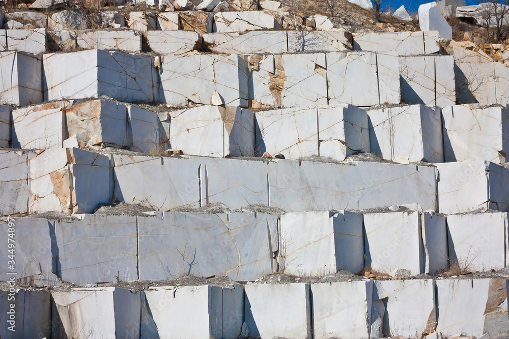 Level pattern of carved white marble blocks in a quarry