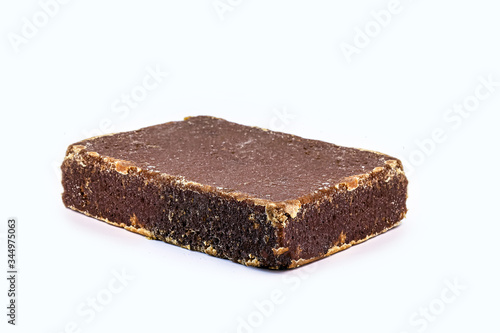 sugar candies, broken into pieces, various flavors. Brazilian rapadura, sweet from the northeast of the country. Isolated white background. photo