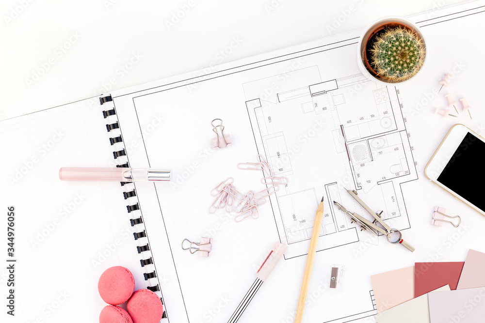 Interior designer table workplace with house plan Interior designer table workplace with house plan