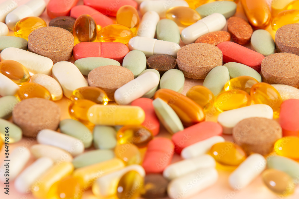 Many colorful pills and tablets.Close up Many colorful pills and tablets.Close up