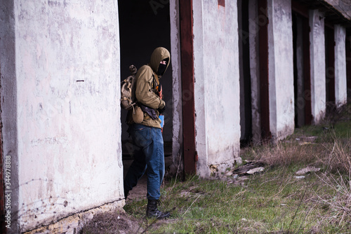 Armed stalker warrior in destroyed building © yurbeck