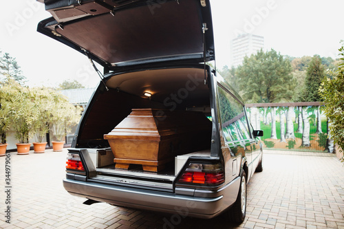 Stampa su Tela photo of a coffin car at a funeral