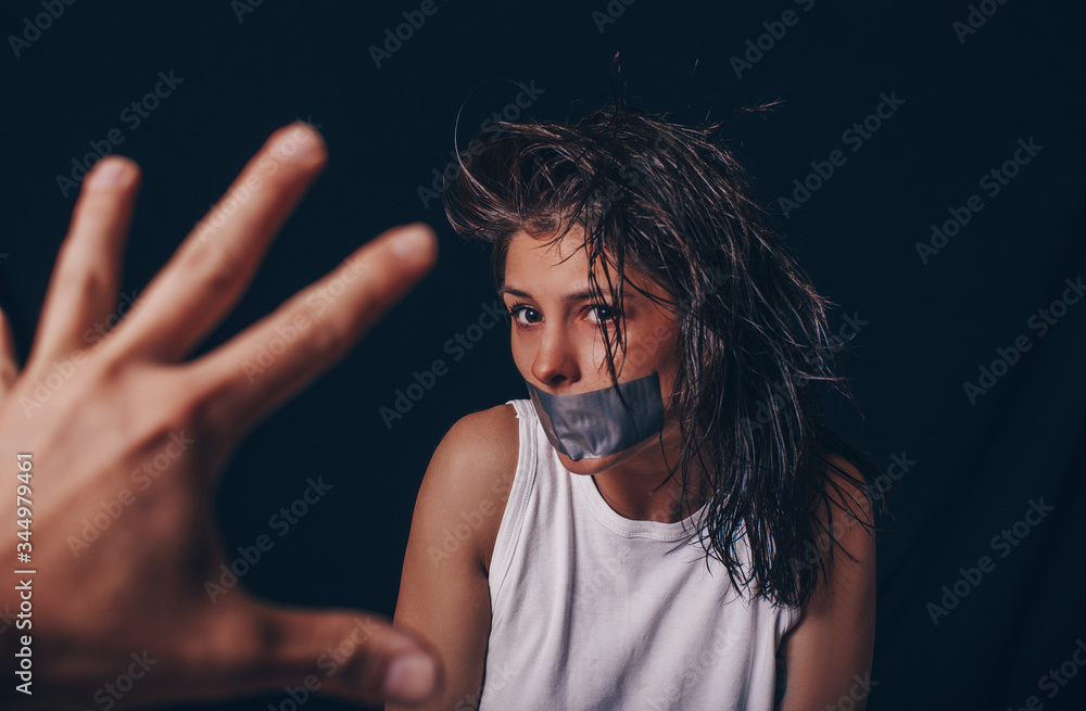 Scared abuse victim being attacked by a mad man in a dark place. man beat sad woman. People. Family problem. Dark background. Conflict. Femele. Help me. Help. Couple. Background. Hands concept.
Scared abuse victim being attacked by a mad man in a dark place. man beat sad woman. People. Family problem. Dark background. Conflict. Femele. Help me. Help. Couple. Background. Hands concept.