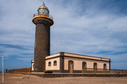 Fuerteventura: view of Punta Jandia Lighthouse in october, 2019. Opened in 1864, Punta Jandia Lighthouse is at the extreme southern cape of the island, in the Jandia natural park