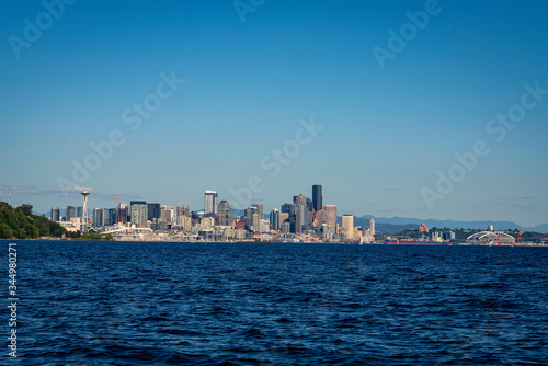 The downtown Seattle skyline rises above Elliot Bay on a beautiful sunny afternoon as seen from the waters of Puget Sound. © JAMES