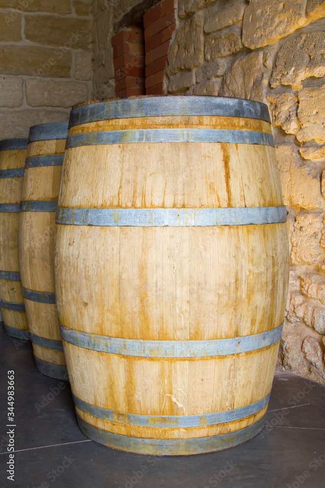 wooden barrel standing behind each other