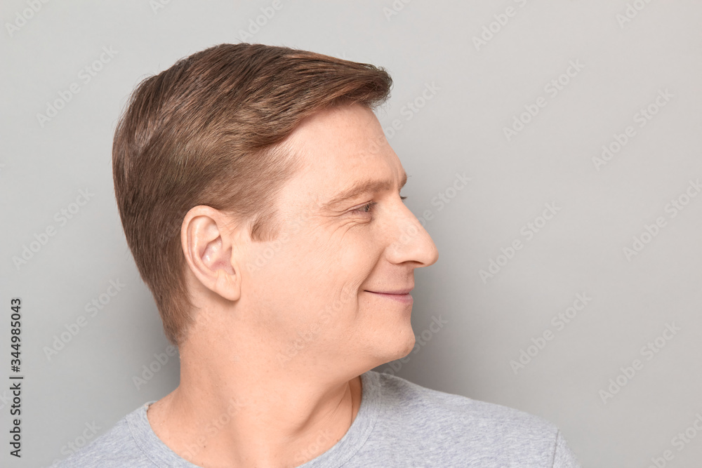 Portrait of blond mature man with happy expression and smiling Portrait of blond mature man with happy expression and smiling