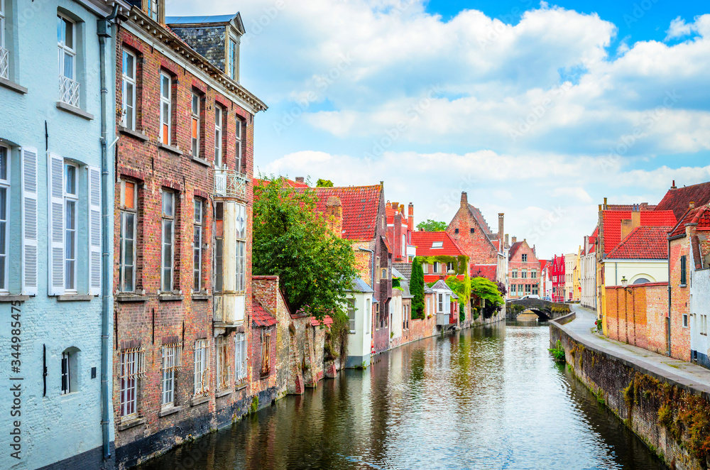 Beautiful canal and traditional houses in the old town of Bruges (Brugge), Belgium