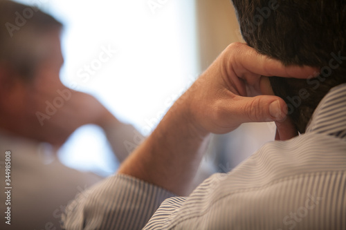 Close up of hands of conversation participant listening and waiting.