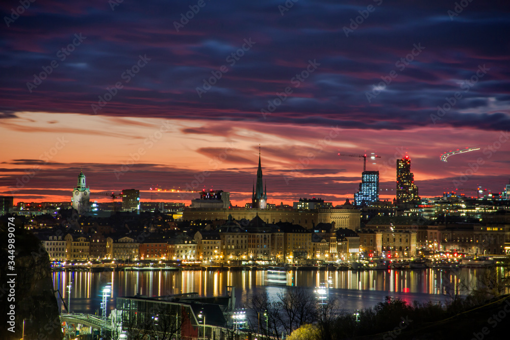 Scenic view of the Old Town (Gamla Stan) in Stockholm with a dramatic sunset, capital of Sweden