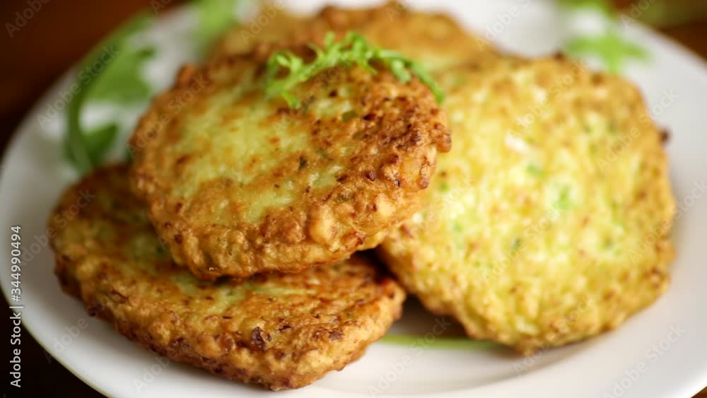 vegetable vegetarian fried cabbage pancakes in a plate vegetable vegetarian fried cabbage pancakes in a plate