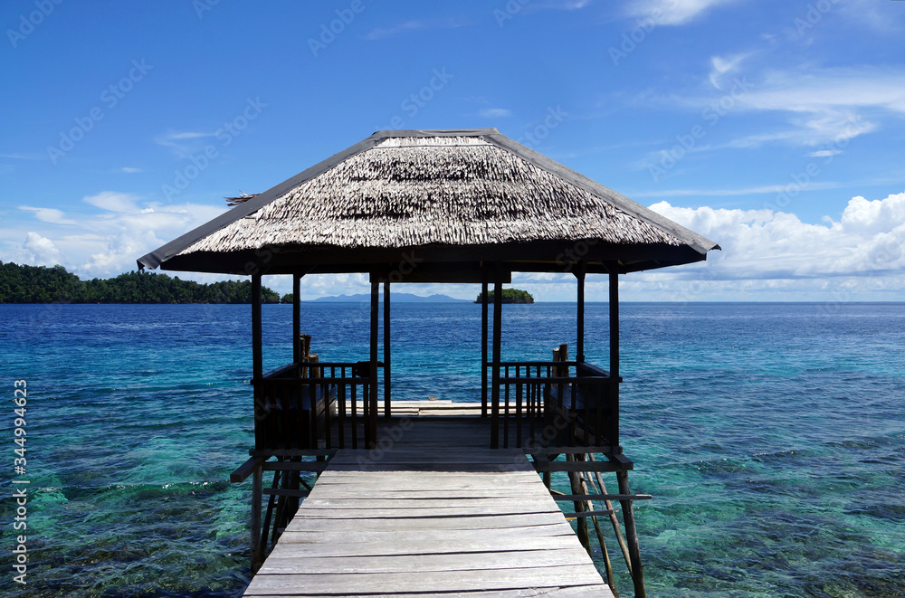 end of a jetty in togian islands in indonesia