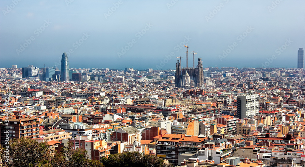A panoramic view of Barcelona city, Catalonia, Spain. La Sagrada Familia seen in the distance.
