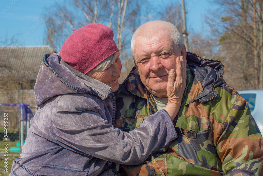 Grandparents, happy old age, in nature in the Park