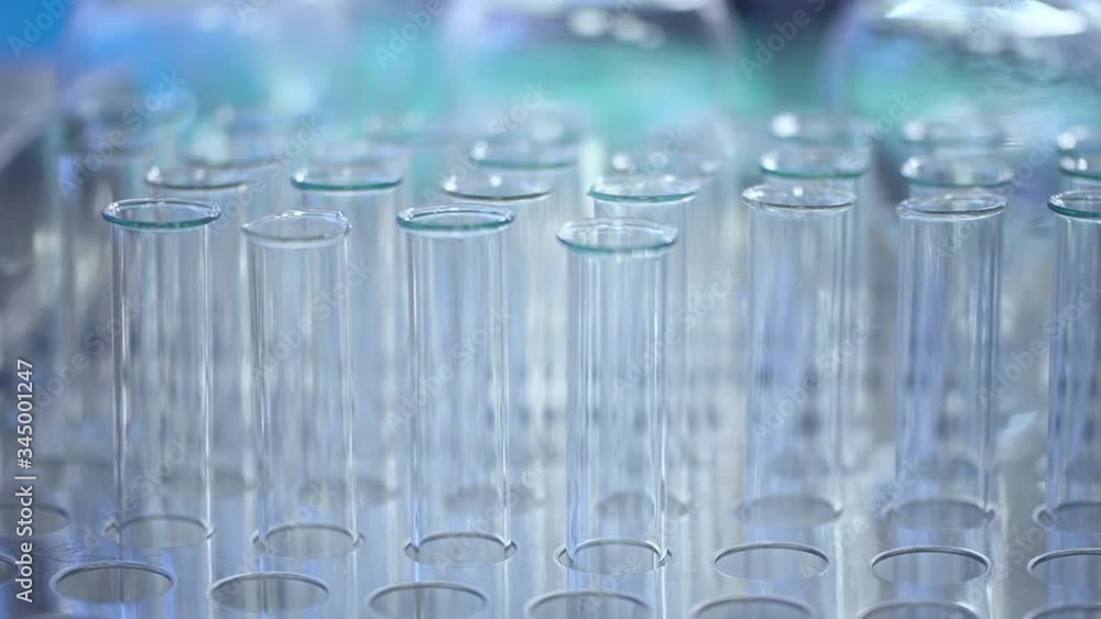 Glass test tubes for analysis in the laboratory Spbd. Close up. pharma laboratory for research. flasks in a row. concept sample, experiment, beaker. moving footage Glass test tubes for analysis in the laboratory Spbd. Close up. pharma laboratory for research. flasks in a row. concept sample, experiment, beaker. moving footage