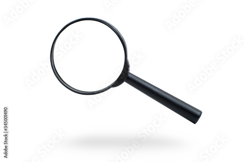 Glass magnifier on a white background. Isolated.