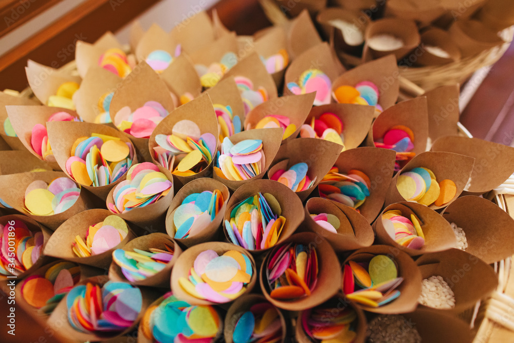 Various colored confetti cones for a party