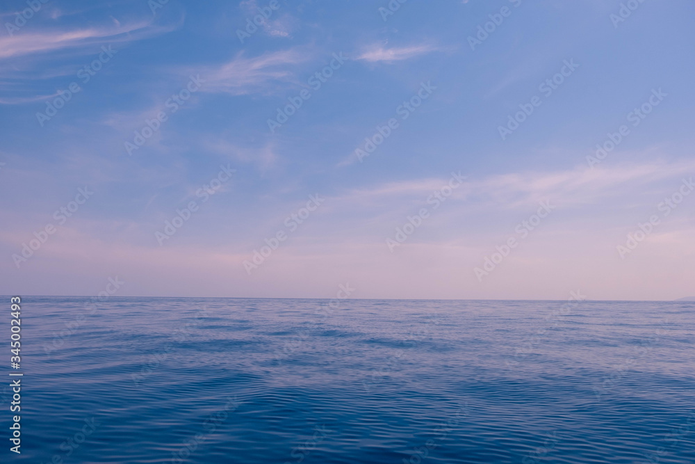 Obraz premium calm sky and blue ocean in morning