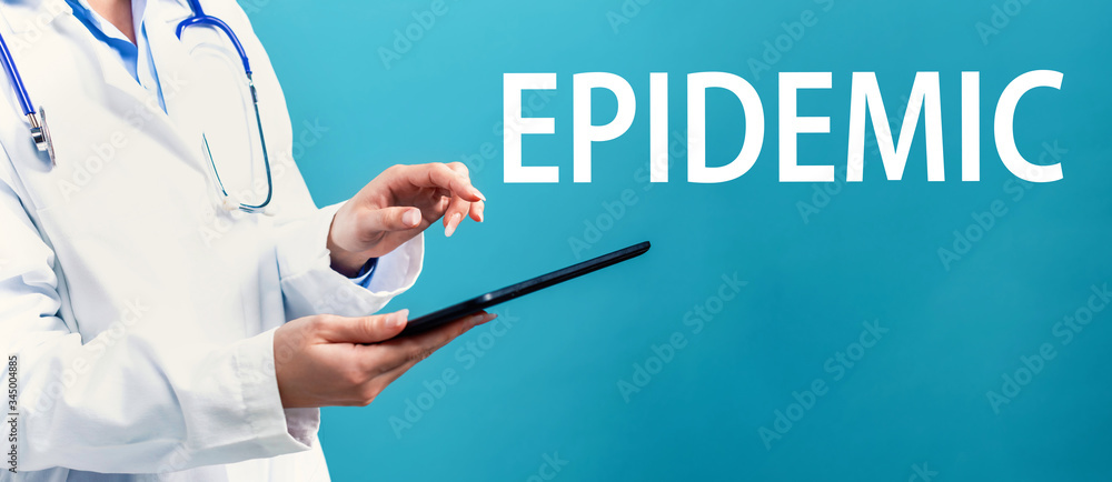 Epidemic theme with a doctor using a tablet computer Epidemic theme with a doctor using a tablet computer