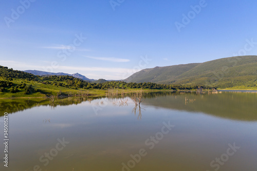 Beautiful view of lake and mountains in a natural preserve in spain