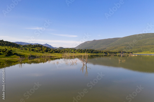Beautiful view of lake and mountains in a natural preserve in spain © iAmTasweer
