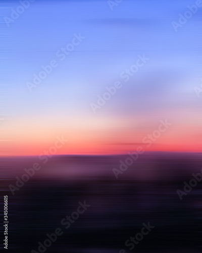 moody motion blur of landscape at sunset with blue pink purple gradients