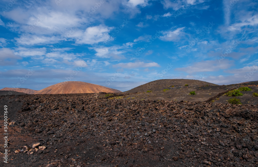 Amazing volcanic landscape of Lanzarote island, Timanfaya national park, Spain. October 2019