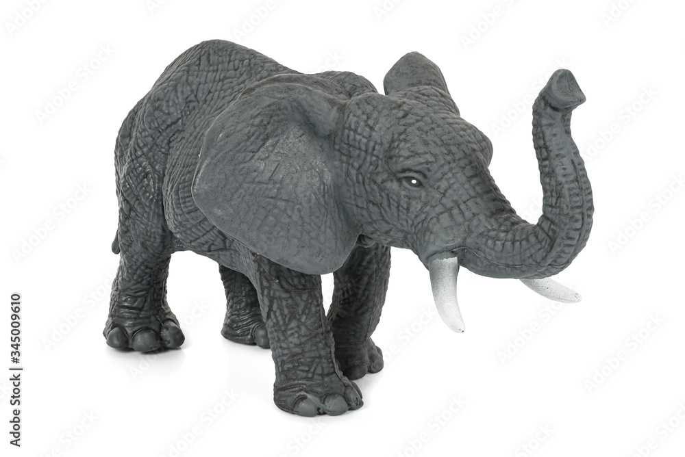 Fototapeta premium Elephant toy figure on white background