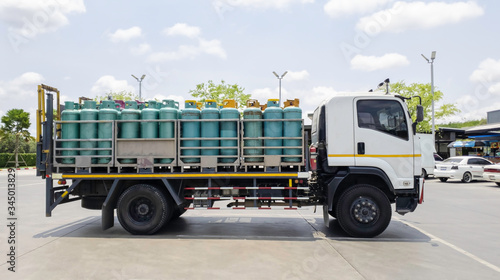 Truck contain natural gas tanks park in gas station