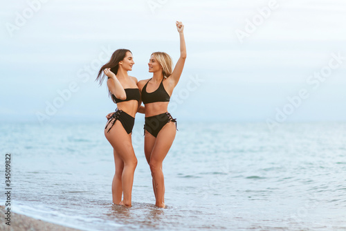 Two Beautiful Women on the Beach