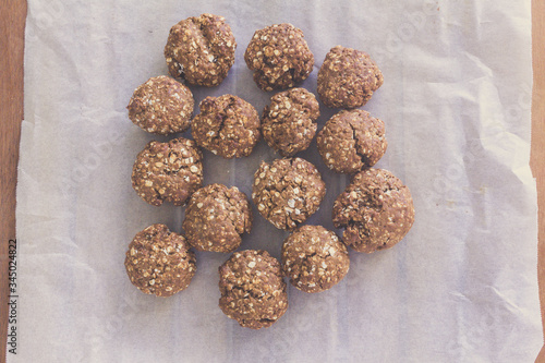 topview of homemade oat cookies on bakery paper