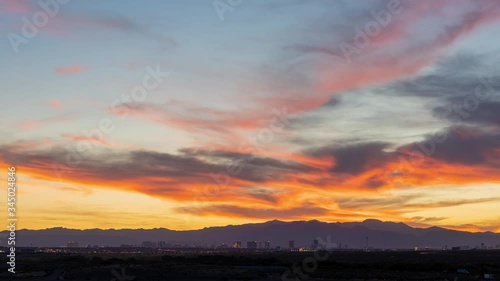 Sunset time lapse of the beautiful strip skyline with red clouds