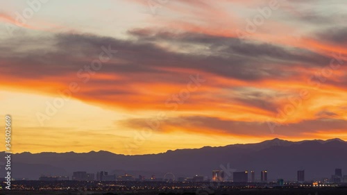 Sunset time lapse of the beautiful strip skyline with red clouds