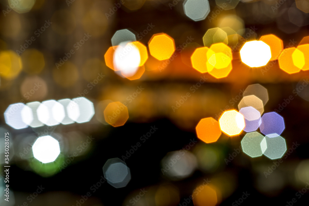 Blurred abstract wallpaper Of bokeh, colorful lights, a beauty of art caused by various effects of light that falls on Blurred abstract wallpaper Of bokeh, colorful lights, a beauty of art caused by various effects of light that falls on
