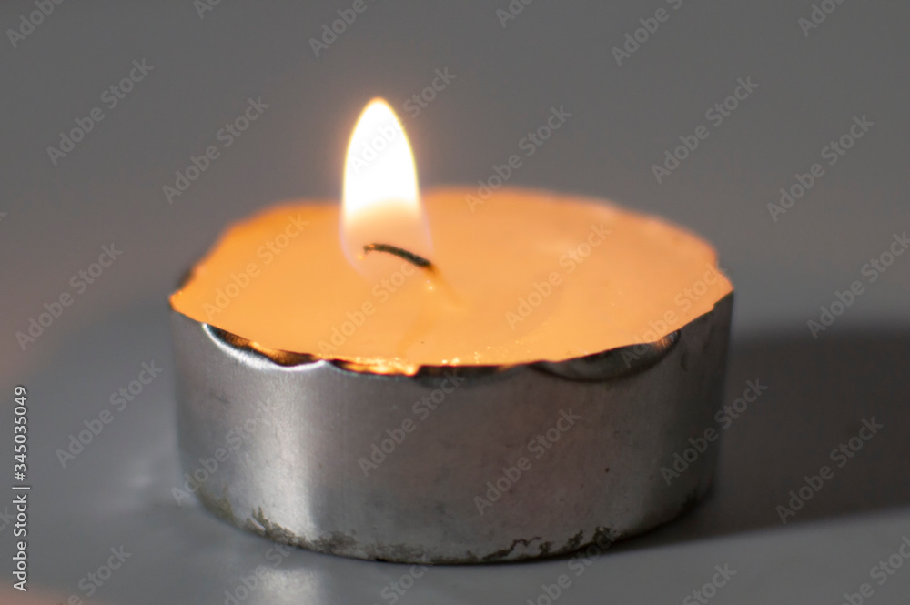 Wax diya lamp on full space with burning brightly Wax diya lamp on full space with burning brightly